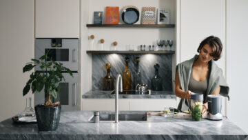 Woman makes smoothie at Orchard Place