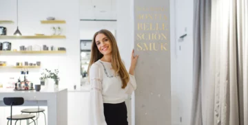 Woman smiles in beauty studio at Orchard Place